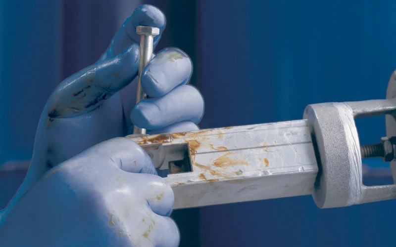 Disposable work gloves provide protection in manufacturing applications