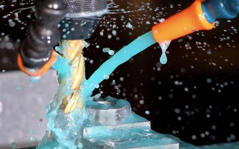 Flood coolant applied to a cutting tool for better lubrication and longer life