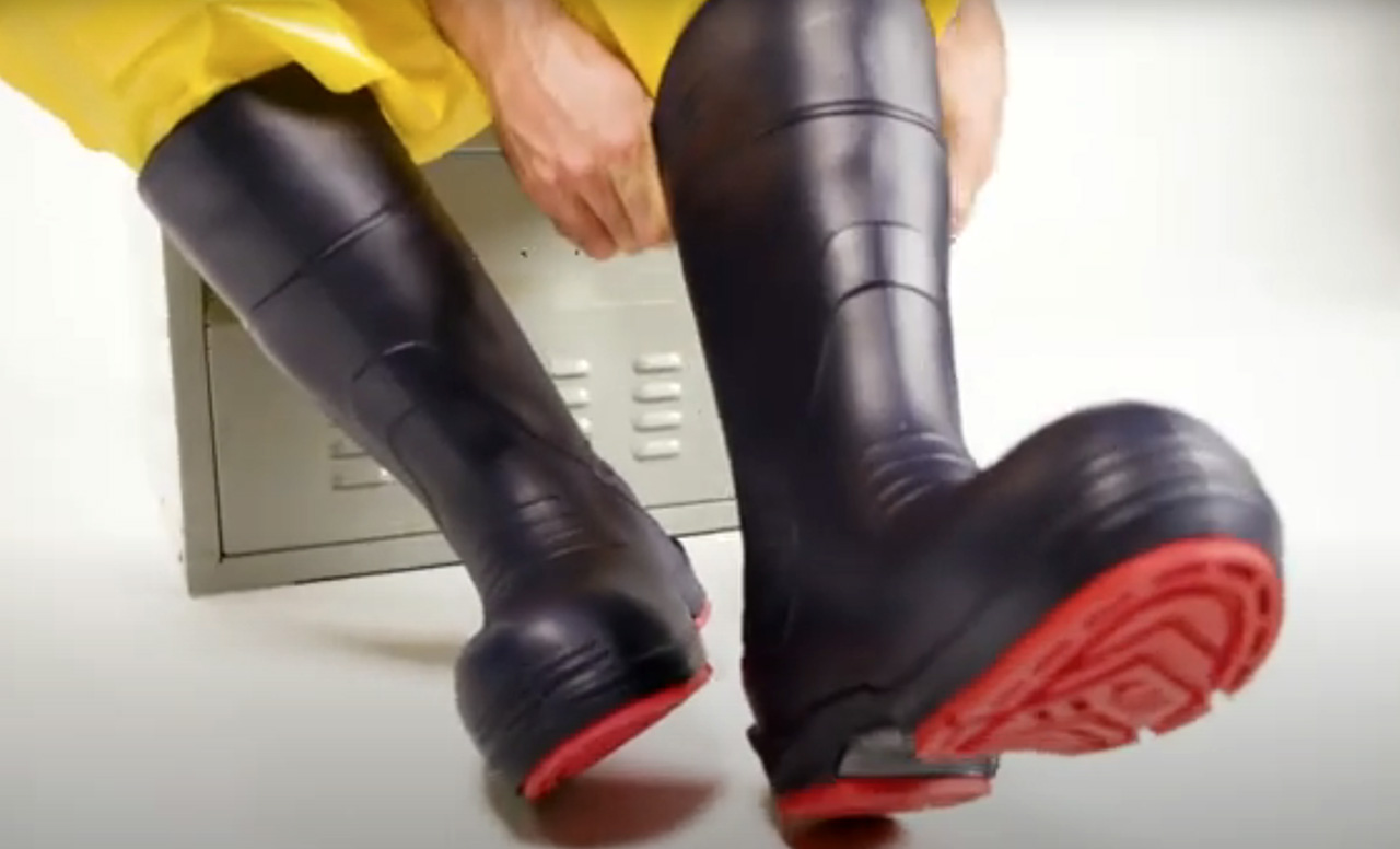 Utility worker putting on Tingley Flite safety boots