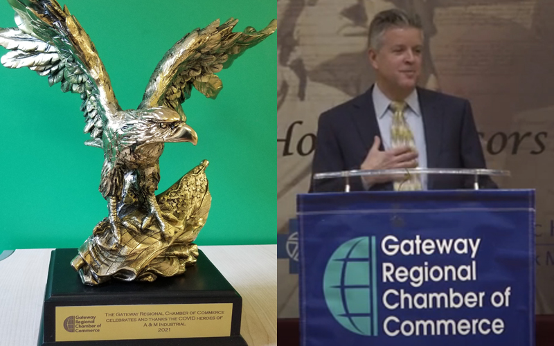 The Gateway Regional Chamber COVID Heroes Award statue; David Young accepts the award for A&M Industrial.