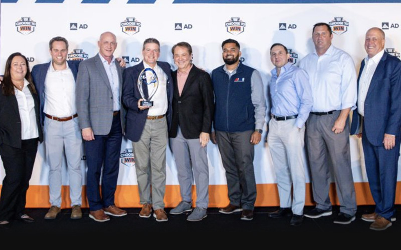 The A&M Industrial team accepts the 2025 Giving Back Award from AD leadership