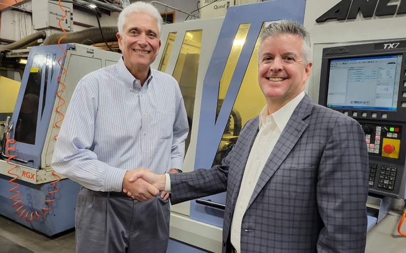 Joe Barbiero of State Industrial Supply shakes hands with David Young, President of A&M Industrial.